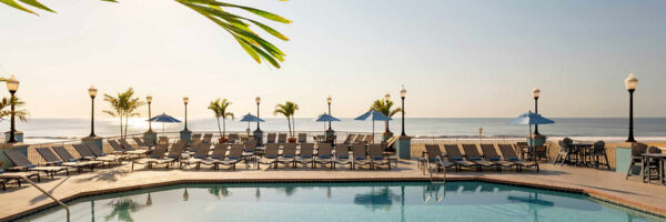 outdoor view of pool, beach and ocean
